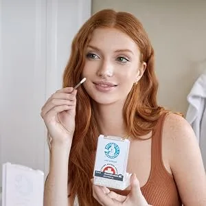 Dr. Piercing Aftercare Sensitive Skin Swabs - Natural Saline-Based Cleaning Solution - Helps Cleanse, Soothe Ear, Nose, Belly Button, Body Piercing Wounds - Clean Storage & Travel Case With 36 Swabs - female using dr. piercing aftercare sensitive skin to treat tragus nose piercing