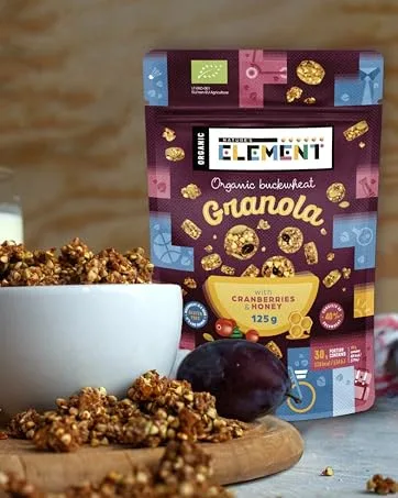 Bio-superfood snack bar-Bookwhile-base-ballast-bar-20 individual bins-gluten-free cereal bar (beetroot carrot) - eine Schüssel Müsli und eine Packung Müsli auf einem Tisch