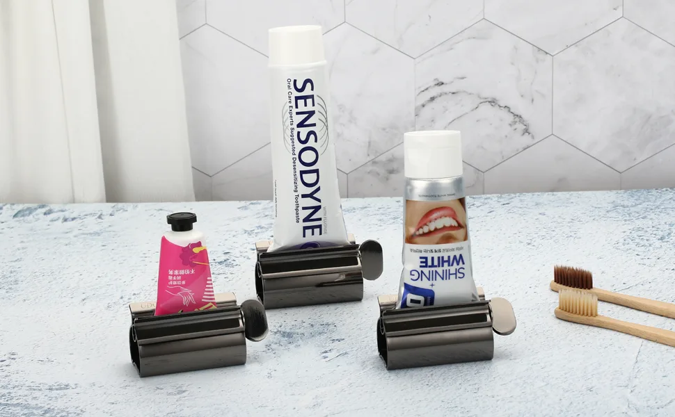 Udqyq tubes queys tubin press 2-pack toothpaste squeezer stainless steel saving toothpaste total squeeze out empty pipes stainless steel toothpaste seat holder with stand function. (Gloss finish black) - squeezer Black 3