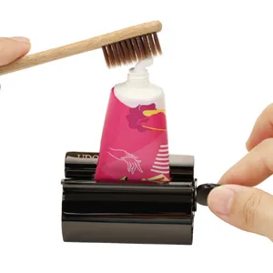 Udqyq tubes queys tubin press 2-pack toothpaste squeezer stainless steel saving toothpaste total squeeze out empty pipes stainless steel toothpaste seat holder with stand function. (Gloss finish black) - twist-B