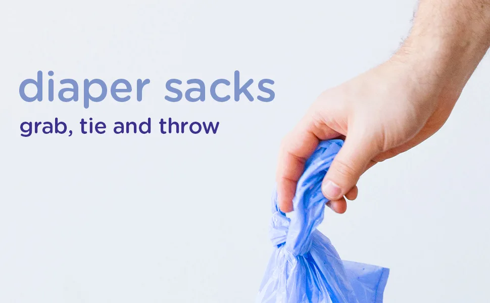 Ubbi Disposable Diaper Sacks Lavender Scented Easy-To-Tie Tabs Diaper Disposal or Pet Waste Bags 200 Count 200 Count (Pack of 1) - diaper sacks: grab tie and throw. a hand holding a diaper sack comes out of the top right corner
