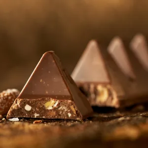 Toblerone Tiny Swiss Chocolate Gift Set Dark Chocolate Milk Chocolate Candy Bars with Honey  Almond Nougat 7.05 oz (25 Pieces) - image