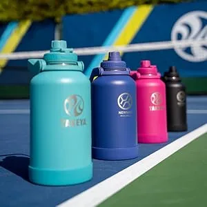 Takeya Pickleball Insulated Water Bottle with Straw Lid 32 Ounce Backspin Pink Backspin Pink 32 oz Straw Lid - bottles lined up