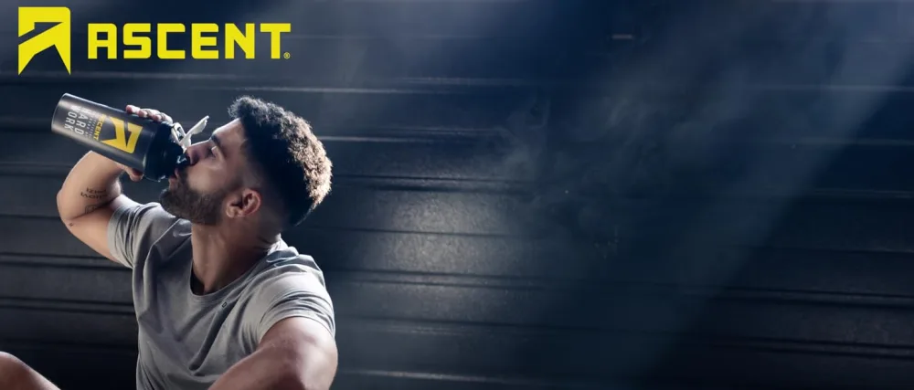 Ascent Clean Creatine Monohydrate Powder - 5G Per Serving Creapure Creatine Supplement - Unflavored 45 Servings - Image of Athlete Drinking Ascent Shaker Bottle