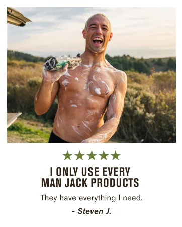 Every Man Jack Mens Aged Bourbon Beard Set - Five Full-Sized Grooming Essentials For a Complete Routine - Beard + Face Wash Beard + Face Lotion Hydrating Beard Oil Beard Butter and Beard Comb - Man showering outside with Every Man Jack body wash
