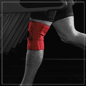 Curad CURIM23333H Performance Series Ironman Knee Support with Side Stabilizers Adjustable Universal - CURAD Performance Knee Support with Sides Support