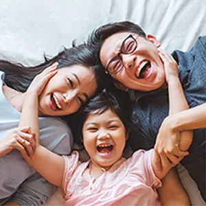 Reach Advanced Design Medium Adult Toothbrush - Family Smiling