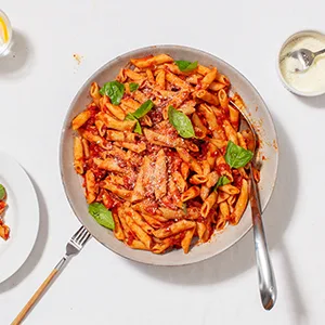 RAOS PASTA LINGUINE 16 OZ - Pasta and sauce in a bowl ready to eat
