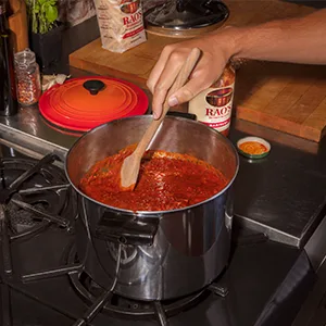 RAOS PASTA LINGUINE 16 OZ - Raos sauce cooking on the stove