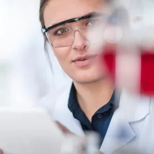 GNC Herbal Plus Maca Root 525mg 100 Capsules Supports Vitality - Researcher doing work in a lab