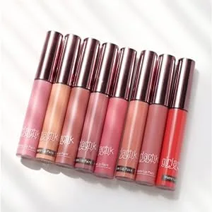 Girlactik Orange Twist Star Gloss - many lipsticks