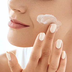 CONTROL CORRECTIVE Beyond Brightening Complex - Brightens Skin Reduces Post-Acne Traces With Tranexamic Acid Glycolic Acid Arbutin And Other Brighteners Improves The Complexion Hydroquinone-Free - Woman Applying Serum
