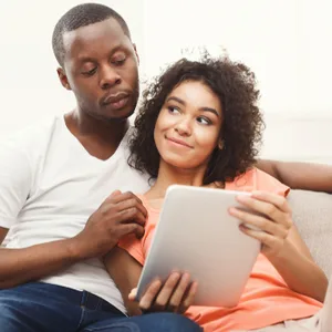 STD at Home Test for Men Trichomoniasis (Trich) CLIA Lab Certified Results - couple in bed checking results