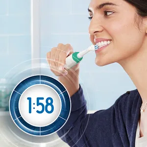 Oral-B Pro 1000 CrossAction Electric Toothbrush, Green - Built in 2-minute timer pulses every 30 seconds to let you know when to switch areas of the mouth