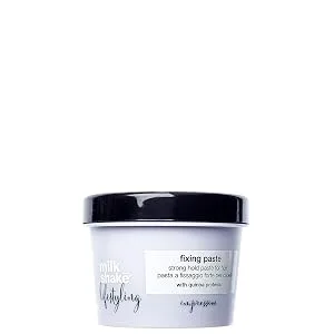 milk_shake Lifestyling Fixing Paste 3.4 Fl Oz - Image of product bottle