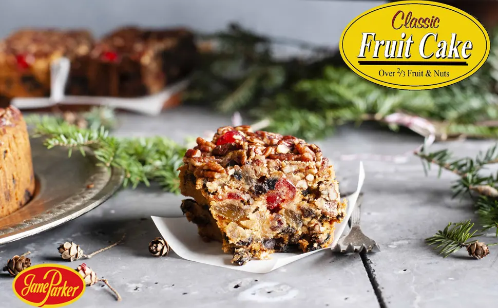 Jane Parker Fruitcake Classic Light Fruit Cake 3 Pound (48 Ounce) Ring in a Collectible Holiday Tin - Classic Fruit Cake Slice