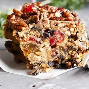 Jane Parker Fruitcake Classic Light Fruit Cake 3 Pound (48 Ounce) Ring in a Collectible Holiday Tin - Jane Parker Classic Fruit Cake Slice