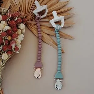 Itzy Ritzy Silicone Pacifier Clip 100% Silicone Pacifier Strap with Clip Keeps Pacifiers, Teethers & Small Toys in Place Features One-Piece Design & Silicone Cord, Pink + Rose Gold Clip - itzy ritzy, itsy ritzy, pacifier clip, beaded pacifier clip, silicone pacifier clip, pacifier leash