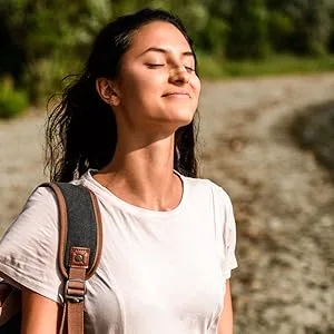 Instaclear Extra-Strength Nasal Strips, Tan 50 ct | Works Instantly, Breathe Better, Nasal Congestion Relief, Stops Snoring, Cold & Allergy, Extra Strength Tan - woman outside hiking breathing better with nasal strip