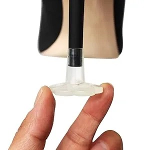 GoGoHeel STOPPERS Heel Protectors - Stops Sinking into Grass (Small) Small (9-11 mm) - STOPPERS Heel Protector being applied to black high heel shoe