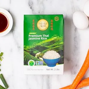 Four Elephants Premium Thai Jasmine Rice Certified Non-GMO 5 lbs 5.0 Pounds - Rice box on counter surrounded by ingredients