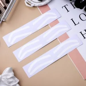 HAPINARY 12 Sheets Brow Charm Stencil Kit Eyebrow Shaping Tape White Eyebrow Ruler Sticker Paper - product information 1