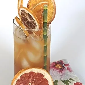 Dehydrated Pineapple Slices / Flowers - 3 oz - 20+ slices - BlueHenry Cocktail decorated with lots of dried fruit