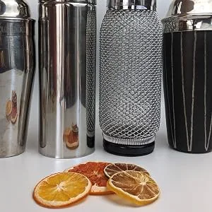 Dehydrated Grapefruit - 3 oz - 25+ slices - BlueHenry dried citrus in front of cocktail shakers