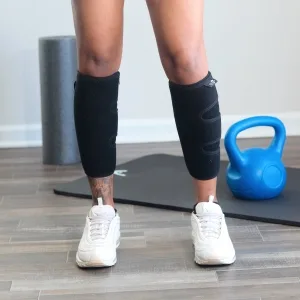 Calf Support Brace 2 Pack, Adjustable Shin Splint Compression Calf Wrap - Woman exercising with a kettle bell in the Calf Support Braces