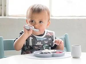 ezpz Tiny Spoon (2 Pack in Blue) - 100% Silicone Spoons for Baby Led Weaning + Purees - Designed by a Pediatric Feeding Specialist - 4 Months+ - mini utensils for independent feeding