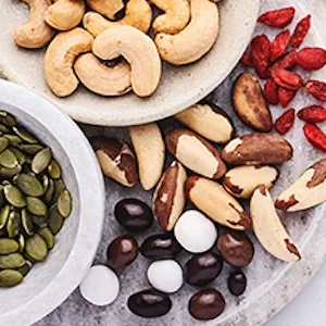 Bass Roasted Salted Cashews 1kg - Assorted nuts and seeds on a platter
