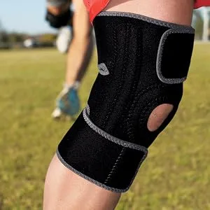 ACE Adjustable Knee Brace, Provides Support & Compression to Arthritic and Painful Knee Joints Adjustable Knee Support - Person wearing ACE Knee Stabilizer while running