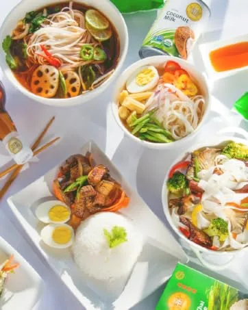 Four Elephants Premium Rice Stick Noodle Non-GMO Verified (3 Pack) (10 mm) 1 Pound (Pack of 3) - Authenticity - A table full or Asian Meals prepared using our products.