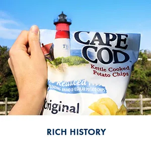 Cape Cod Potato Chips, Reduced Fat Kettle Cooked Chips, Variety Pack, 30 Count - Cape Cod potato chips snack bag in front of a lighthouse