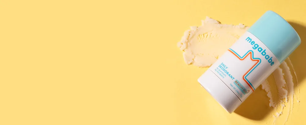 Megababe Beachy Pits Daily Deodorant Fresh Scent 2.6 Ounce Stick 1 - Beachy pits on yellow background.