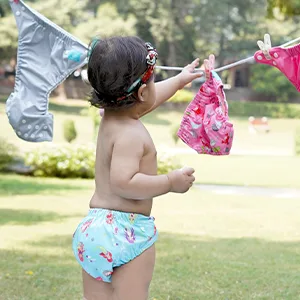 Charlie Banana Reusable Swim Diaper with Snaps, Easy-On and Off, Snug Fit to Prevent Leaks, Construction, X-Large (27-44lbs) Construction X-Large - colors