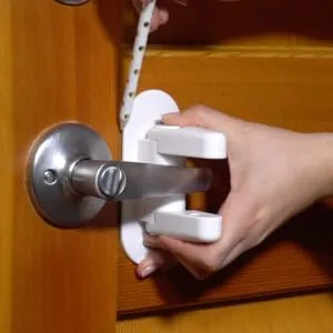 Door Lever Lock (2 Pack) Child Proof Doors & Handles 3M Adhesive - Child Safety By Tuut - outsmart out smart prevent door handle lock locks lever childproof child proof childproofing knob