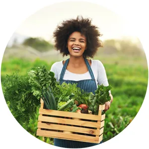 Gerber Juice, White Grape, 32 oz - Woman with fresh produce from field.