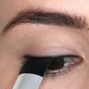 The Arc Brush | Dual Ended | C Shape and Angled Brush| Expert Easy Application | Cruelty-Free - arc brush pressing shadow onto upper lash line
