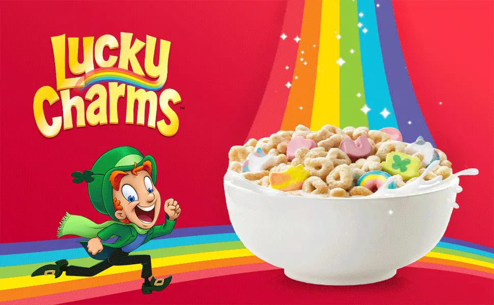 Lucky Charms Smores Breakfast Cereal with Marshmallows 18.0 Ounce (Pack of 1) - Leprechaun Lucky running next to a bowl filled with Lucky Charms cereal.