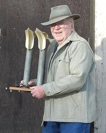 PEET, Power Cell Shoe and Boot Dryer - Gene Peet holding original Peet Dryer