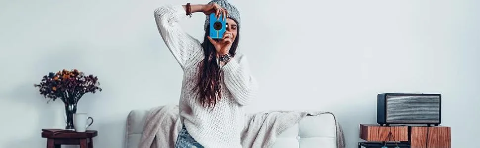 Zink Polaroid Snap Instant Digital Camera (White) with ZINK Zero Ink Printing Technology White Snow Camera - woman taking photo with blue camera