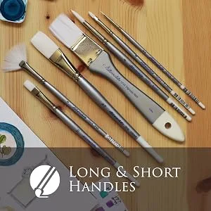 Silver Brush Limited 1506 Silverwhite Angular Brush, Watercolor, Acrylics, Gouache, or Oil Brush, Size 1/2 Inch, Long Handle Angular - Long Handle Size - 1/2 - A set of paintbrushes lying next to art supplies.