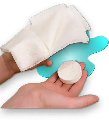 WYSI Multi-Purpose Expandable Wipes, Just Add Water - 100 Compressed Tablets and Travel Tube - hand holding puck & expanded 17x21