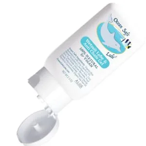 Aloe Cadabra Ocean Safe Lube - white bottled wetsuit lubricant with cap opened and tilted to the right side.