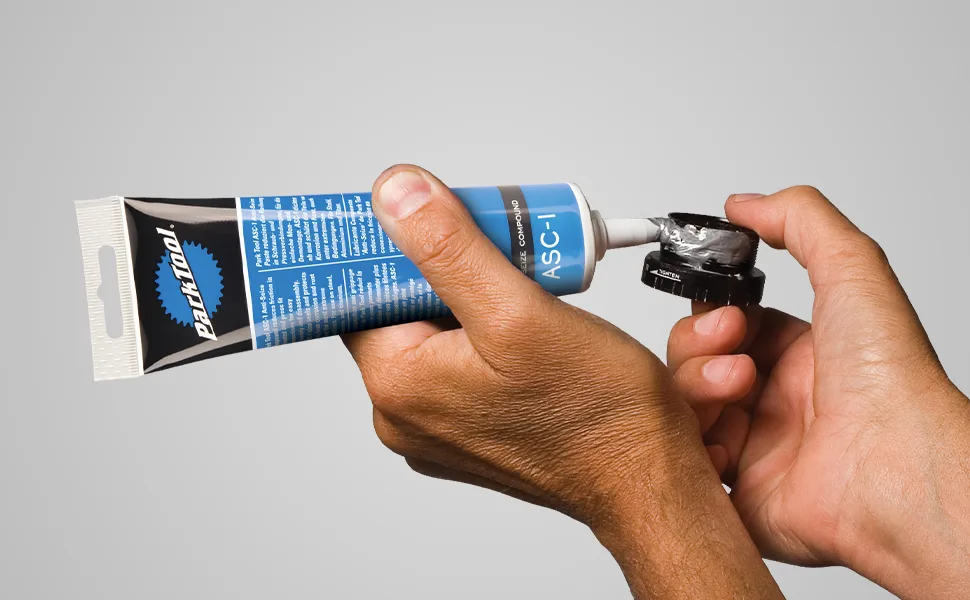 Park Tool ASC-1 Anti-Seize Compound 1 One Color - Park Tool ASC-1 being applied to threaded bottom bracket cup