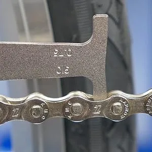 Park Tool CC-3.2 Chain Wear Indicator Tool 1 Silver - Bicycle chain with zero percent wear as measured by Park Tool CC-3.2 Chain Checker