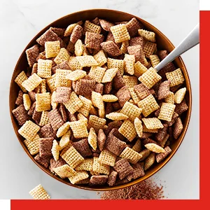 Rice Chex Cereal, Gluten-Free Cereal, 12 oz - Bowl filled with different flavors of Chex breakfast cereal squares