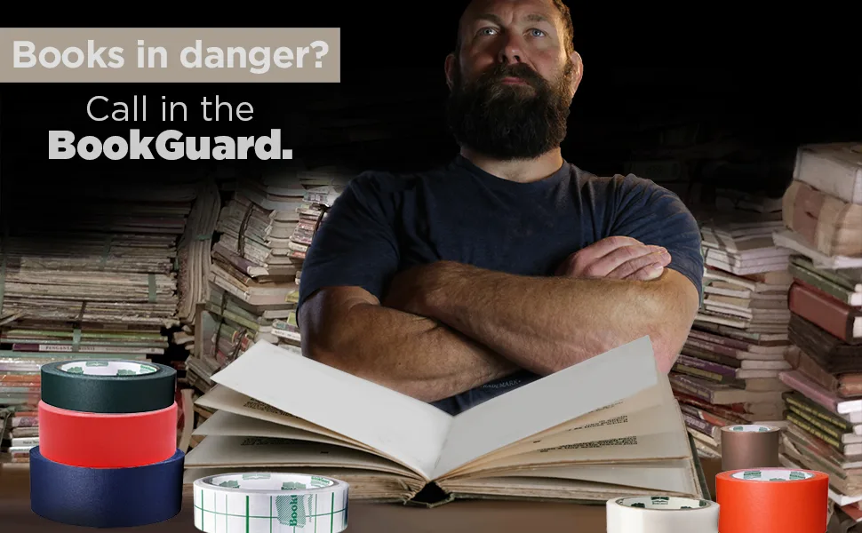 BookGuard 1 Inch Premium Bookbinding Repair Cloth Tape, 15 Yard Roll Black - BookGuard stands behind worktable prepared to begin his mission.
