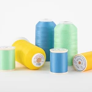 Superior Threads So Fine 3-Ply 50 Weight Polyester Sewing Thread Cone - 3280 Yards (#504 Silver Screen) - So Fine spools and cones displayed on a white background